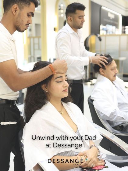 Unwind with your dad at Dessange. This image captures a quiet moment of relaxation during a father-daughter salon day, a perfect gift of experience and time spent together.