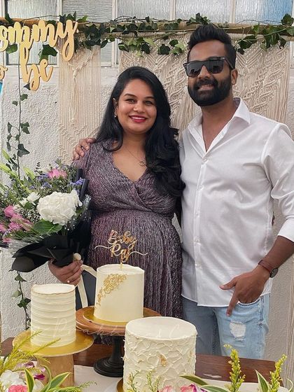 The happy couple at their baby shower celebration. It was a joy to create this beautiful setting for them, complete with a floral and macrame backdrop that made for the perfect photo opportunity.