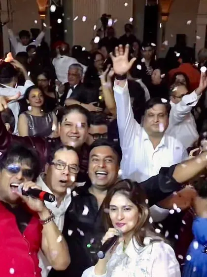 A snapshot of the wild New Year's Eve party in Hong Kong. The confetti is flying, and everyone is on the dance floor.