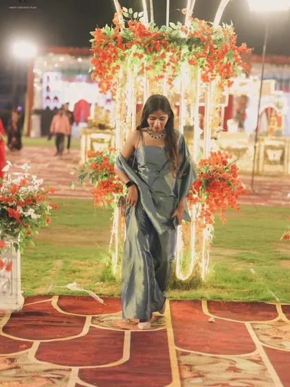 Another look at my Sangeet night outfit, showing how I combine style with the demands of being an active event anchor. My presence is designed to capture attention even before I speak.