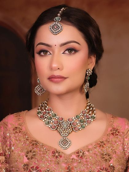 Another angle of this stunning pastel look. The makeup is consistent and beautiful from every view, ensuring the bride looks perfect in all her photos.