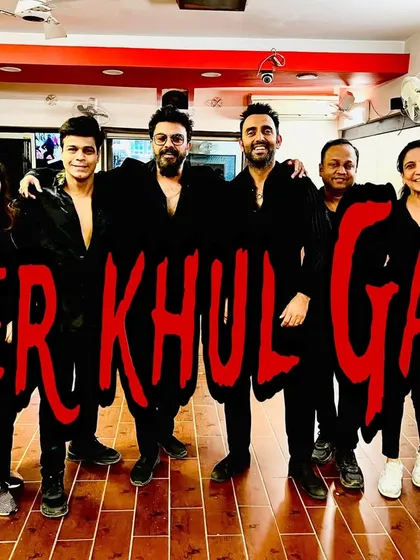 The team behind the magic. This is a group photo of our instructors and senior members after a successful performance of 'Sher Khul Gaye'. It captures the camaraderie and celebratory spirit of our studio.