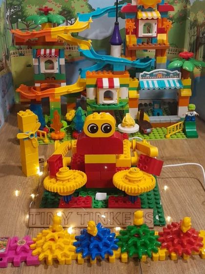 A colorful and imaginative amusement park built with LEGOs by our 'Tiny Tinkers' team for the FIRST LEGO League competition. The project uses gears and motors to create moving parts.