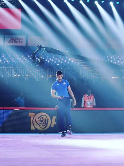 Walking on the mat under the bright lights. A moment to take it all in and count the blessings.