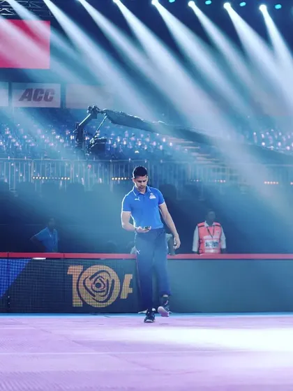 Walking on the mat under the bright lights. A moment to take it all in and count the blessings.