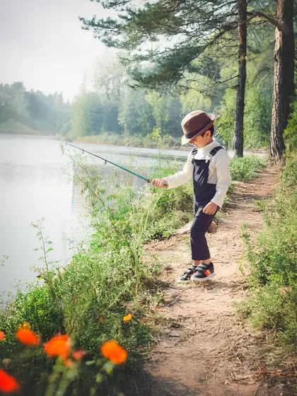 This is my own son's birthday shoot. We created this magical fishing scene with a bit of photo editing, showing how we can craft a unique outdoor portrait even when the perfect location isn't available.