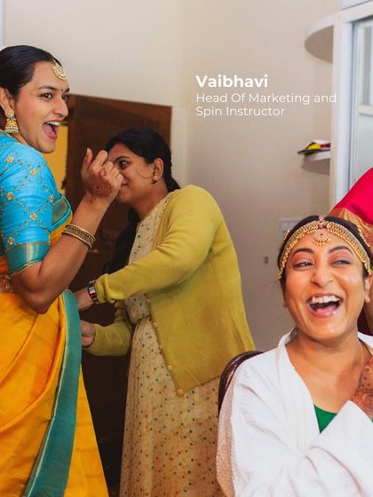 A candid shot of bridesmaids getting ready. Our client Vaibhavi, a spin instructor, needed versatile looks, and we focused on comfort and personal style that allowed her to be herself.