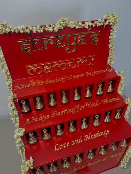 A close-up showing the custom gold lettering, which includes the bride's name and heartfelt blessings, adding a deeply personal touch to the ceremonial gift.