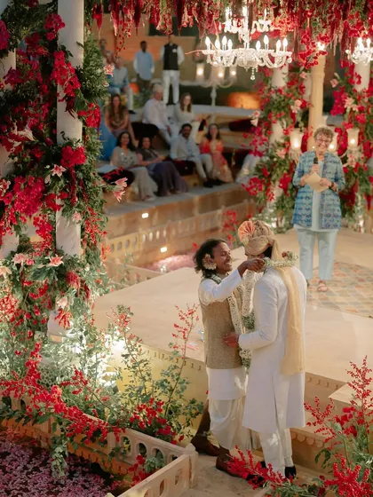 For Kahran and Gourav's Vogue-featured wedding, we designed this breathtaking mandap, using monochromatic red florals to create a powerful contrast against the Jaisalmer sandstone. This ceremony was a testament to their story, blending tradition with a bold, modern vision.