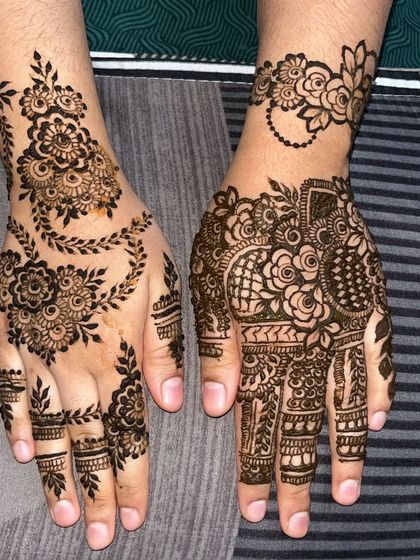 A unique, asymmetrical design where one hand has a traditional floral vine and the other features a more modern, bracelet-style pattern. This is perfect for clients who want something different.