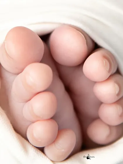 The tiniest details are often the most precious. I make sure to capture close up shots of your newborn's tiny feet and hands. These are the details you will want to remember long after they have grown.