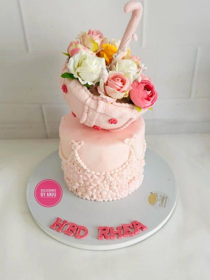 A full view of the stunning floral umbrella cake, a true work of edible art.