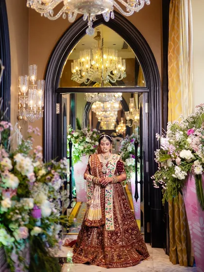 A bride's majestic entrance at the iconic Taj Mahal Palace. We focus on creating these breathtaking, magazine-worthy bridal portraits that feel both royal and deeply personal.