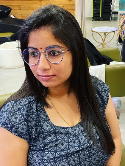 A happy client after her keratin treatment. Her hair is now smooth and easy to manage, which will save her a lot of styling time.
