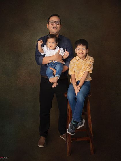 A portrait of a father with his two sons. Capturing the bond between a dad and his boys is always a special experience.