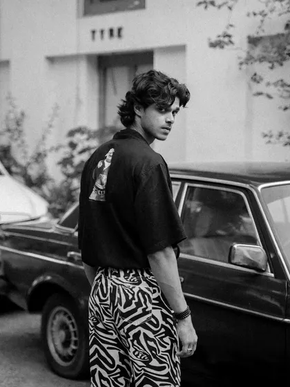 This series features a male model with a vintage Mercedes, shot in both color and black and white. It showcases a cool, retro vibe perfect for a fashion editorial or model portfolio.