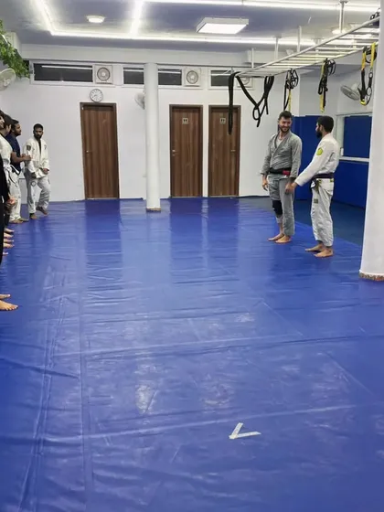 Respect and discipline are the foundation of martial arts. Here, students line up at the start of a seminar, ready to learn and challenge themselves, showing the formal structure of our training.
