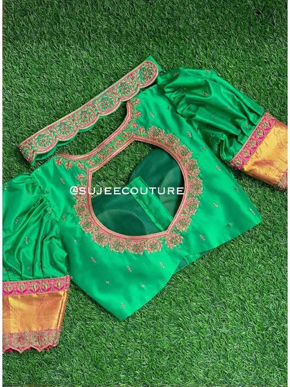 Another view of the green puff-sleeve blouse, showing the embroidered hip belt that was custom-made to match.