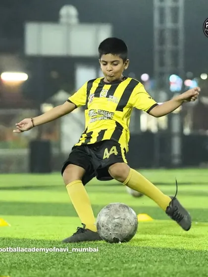 A player winds up for a powerful shot during a training drill.