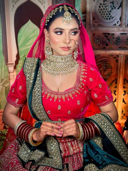 A side profile showcasing the clean hairstyle and the perfectly blended makeup.