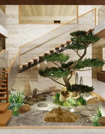 This is how we turn an overlooked area into the heart of the home. We designed this tranquil Zen garden under a staircase, creating a serene focal point with a carefully pruned bonsai, natural rock formations, and a pebble mosaic. It’s a perfect example of our indoor courtyard design service.