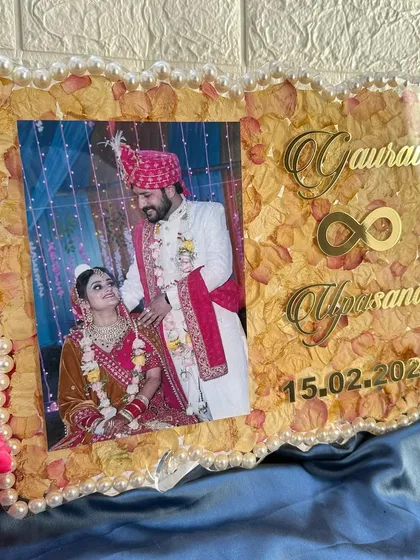 Another view of the frame, showing the infinity symbol between the couple's names, symbolizing eternal love.