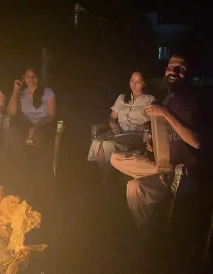The warmth of the bonfire brings us together. These informal evening gatherings are where some of the most meaningful connections and conversations happen.