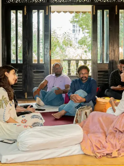 A small group discussion in one of the cozy corners of the festival. These unhurried conversations are where some of the most meaningful connections happen.