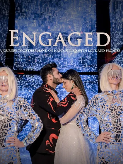 The engagement photo that says it all. We conceptualized this shot with futuristic dancers and a galaxy-themed backdrop to announce their journey together.