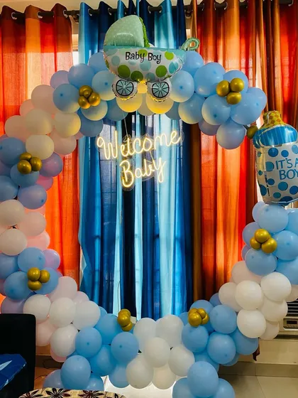 Another view of the blue and white "Welcome Baby" boy balloon ring, showing the vibrant colors and fun foil balloon accents.