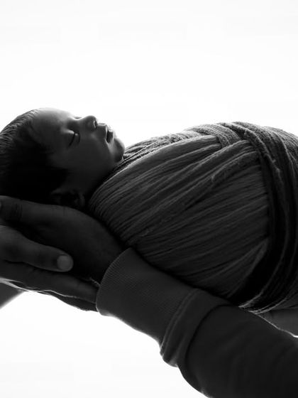 Held up by love. This artistic black and white photo symbolizes the way your family will always support and lift up your child.