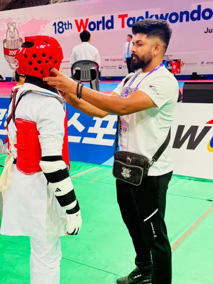 In the heat of competition, focus is everything. I am here for my students every step of the way, providing final words of encouragement and ensuring their gear is perfect for a safe match.