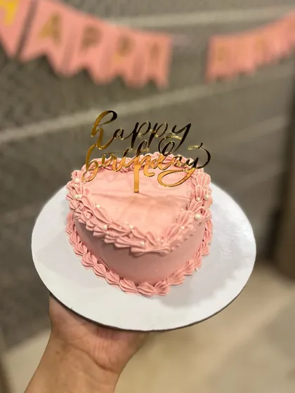 A simple pink heart-shaped bento cake, perfect for Valentine's Day or just to say "I love you."