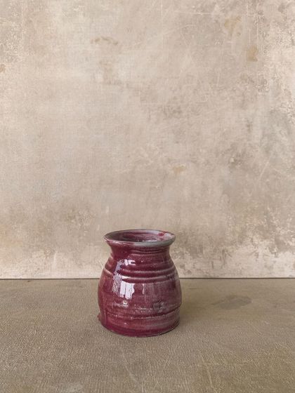 Another small, magenta-glazed pot, showing the beautiful variations that happen in the kiln.