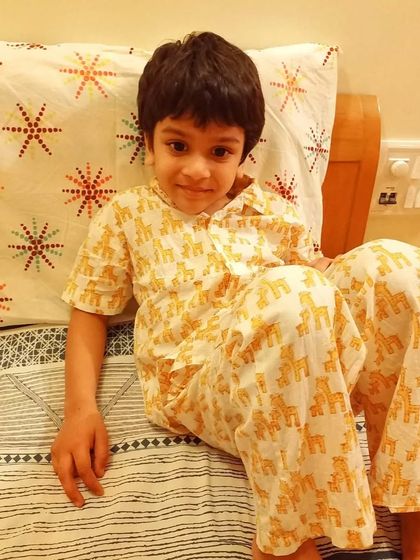 Another happy customer in our Giraffe print PJs. The soft cotton and fun design make it a favorite for both kids and parents.