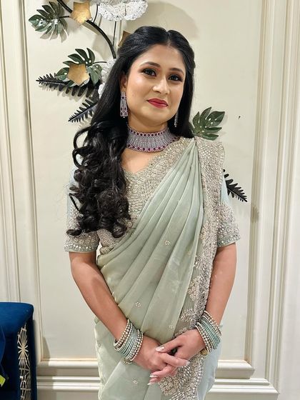 My engagement bride Riya looking beautiful in her saree. The soft waves in her hair and glowing makeup complete this classic look.
