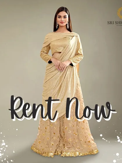 Make a statement with this splendid golden draped Indo-Western outfit. It is a chic and modern choice for anyone looking to blend contemporary style with traditional elegance.