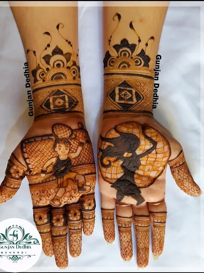 A closer look at the sports-themed engagement mehendi. The contrast between the detailed figures and the simple wristband makes the portraits stand out.