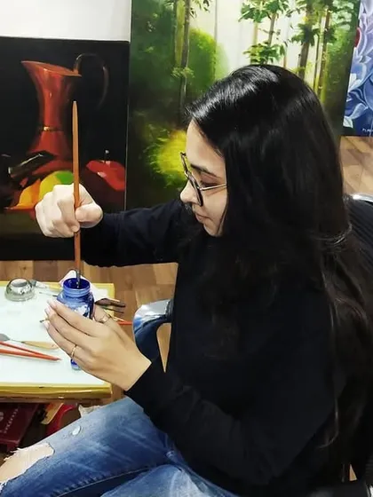 Here’s a behind-the-scenes look at me working on a large Krishna painting in my studio. This stage is all about blocking in the foundational colors.