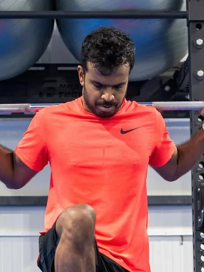 An athlete performs a barbell step-up at our Jayamahal facility. This center is where training meets performance for everyone who walks through our doors.