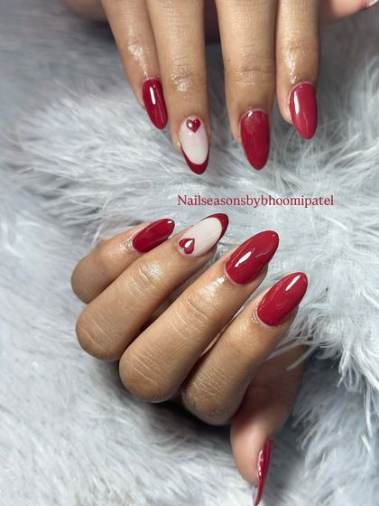 The almond shape elongates the fingers and makes this classic red manicure look even more elegant.