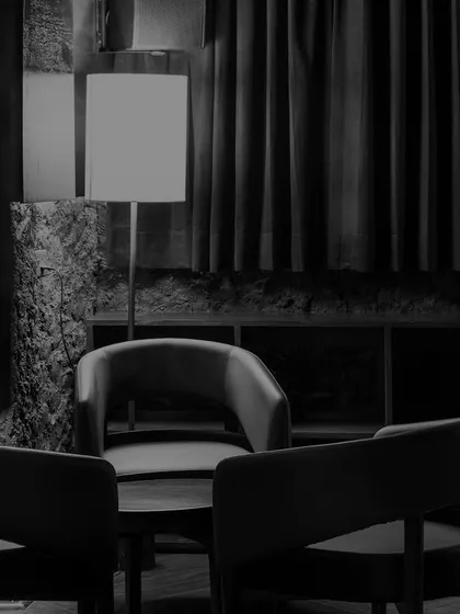 Within Lair’s walls, mysteries reside, where elegance and allure intertwine. The interplay of soft curtains, textured walls, and modern furniture creates a layered and intriguing ambiance.