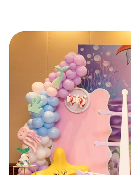 A detail from the backdrop, showing the beautiful textures and colors used to create the underwater scene.