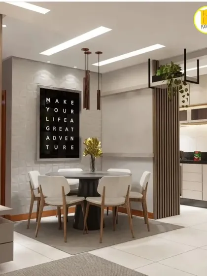 This image shows the integration of the living, dining, and kitchen areas. The consistent color palette and lighting design create a unified and spacious home interior.