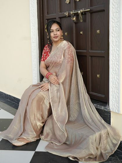 Another beautiful shot of the client enjoying her festive look, with our earrings adding that special sparkle.