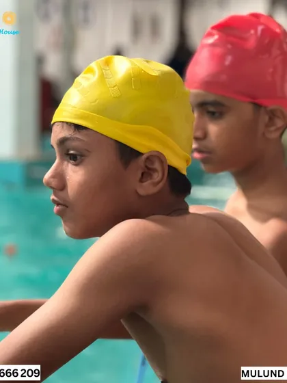 Happiness is a lap away. Two young swimmers focused and ready for their event at our 2024 Swimming Gala.