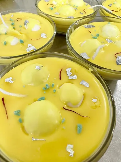 A close-up of my Rasmalai soy candles, looking absolutely divine with their realistic texture and silver leaf accents.