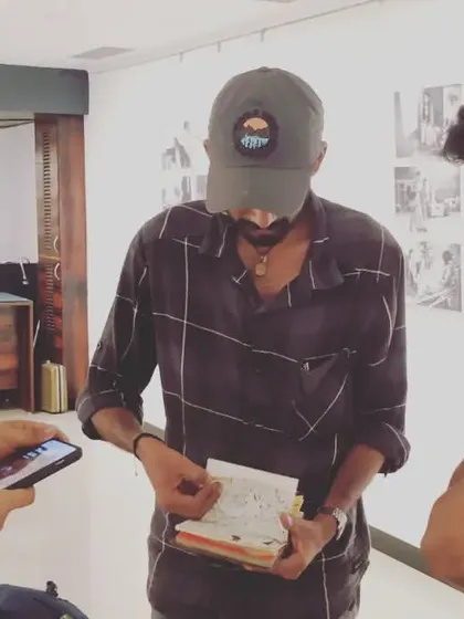 Sharing my sketchbook with fellow artist Tarun Chouhan at an exhibition. It's always great to connect and share the process.
