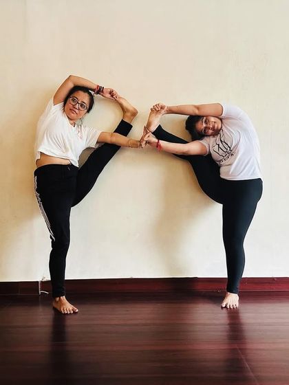 Compass pose with my favorite gal. This partner stretch is a fun way to work on hamstring and shoulder flexibility together.