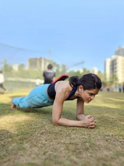 Holding a strong plank, which is not just a strength exercise but also a form of active stretching for the posterior chain.